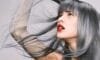 Woman with grey hair showing premature greying before natural treatment